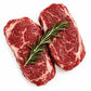 Carne cruda con ramitas de romero